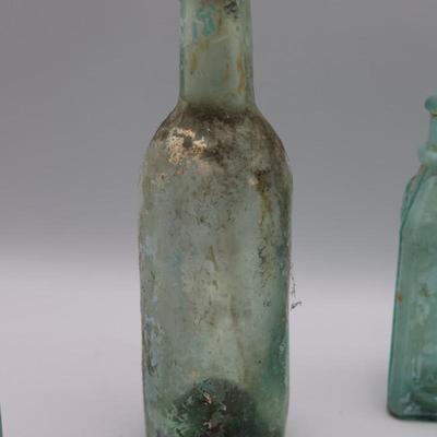 Variety of Antique Glass Bottles