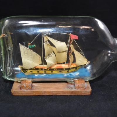 Small Vintage â€œQueen Anneâ€™s Revengeâ€ Ship In A Bottle 6x3.5