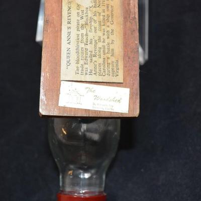 Small Vintage â€œQueen Anneâ€™s Revengeâ€ Ship In A Bottle 6x3.5