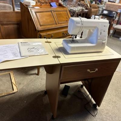 Kenmore sewing machine and cabinet