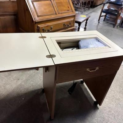Kenmore sewing machine and cabinet