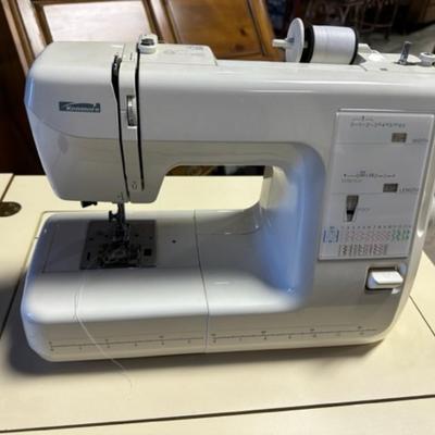 Kenmore sewing machine and cabinet