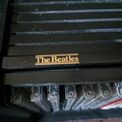 Collection of 16 Beatles CD's in a Beatles Case