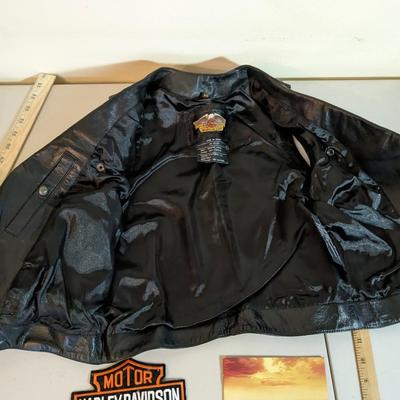 Collection of Harley Davidson Merch and Leather Vest
