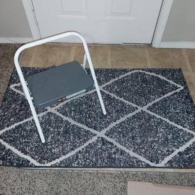 RUBBER BACK THROW RUG AND A FOLDING STEP STOOL