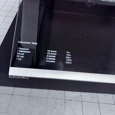 Nice Cook Book Stand. Hold Page Open and Protects from Splashes