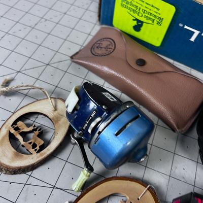 Lot of Weird Stuff: Camera, Weight Belt, Glass Case, Golf Ball, Paper Weight 