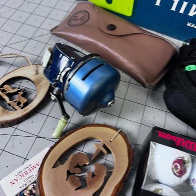 Lot of Weird Stuff: Camera, Weight Belt, Glass Case, Golf Ball, Paper Weight 