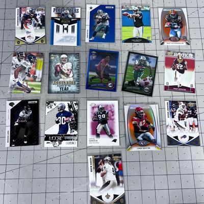 (16) Foot Ball Cards ALL SLEEVED