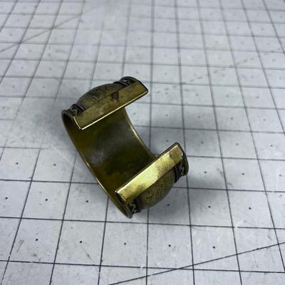 Vintage Brass Cuff Bracelet with Elephants on it. 