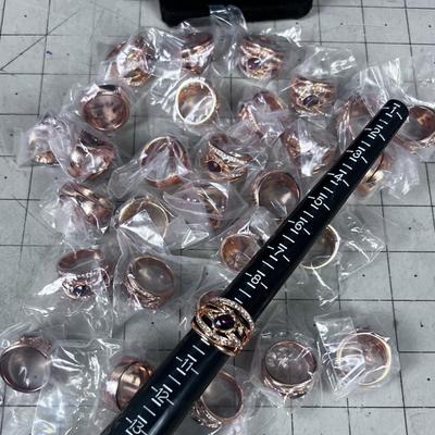 A Big lot of NEW Rose gold Looking Fancy Rings (28 lot) 