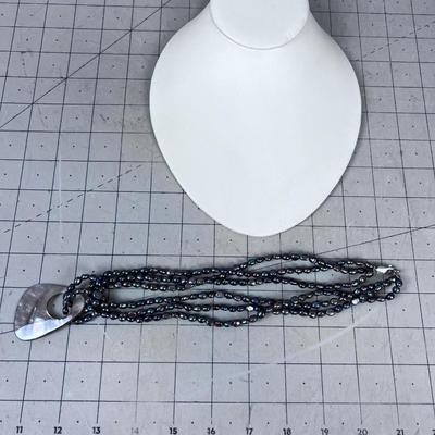 Black Fresh water Pearls with Mother of Peal Pendant and Sterling Clasp