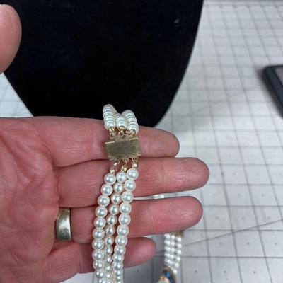 WOW! Pearls and Lapis or Soda Lite. 
