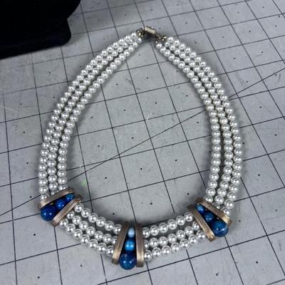 WOW! Pearls and Lapis or Soda Lite. 