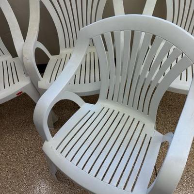Lot 876 four plastic Rubbermaid stackable chairs