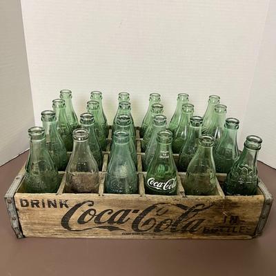 Vintage Coca-Cola Bottles and Wooden Case