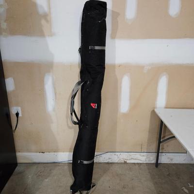 Pair of Blizzard Bushwacker Skis, Poles and Travel Bag (G-DW)