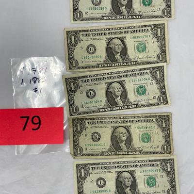 Lot of 5 $1 bills.