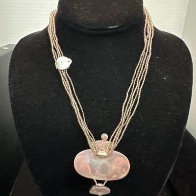 Lot 1022 beaded necklace and sterling pendant
