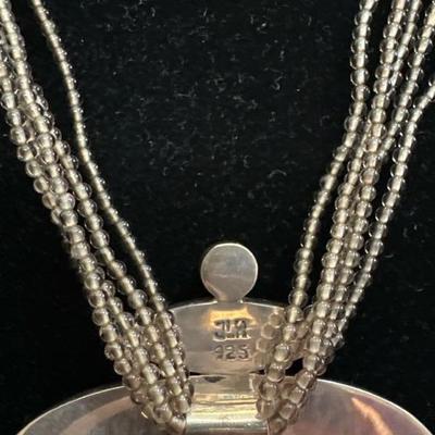 Lot 1022 beaded necklace and sterling pendant