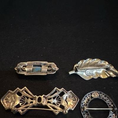 Lot 1041 sterling brooches/pins