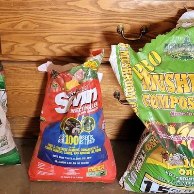 Turf Builder, Seven Insecticide, and Mushroom Compost