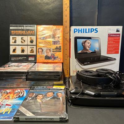 LOT 59L: Phillups & RCA Portable DVD Players w/ DVDs & More