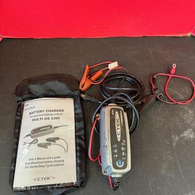 Lot 1217 battery charger, master grip tools, and storage box