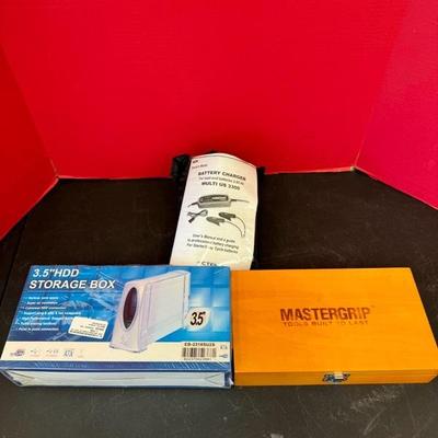 Lot 1217 battery charger, master grip tools, and storage box