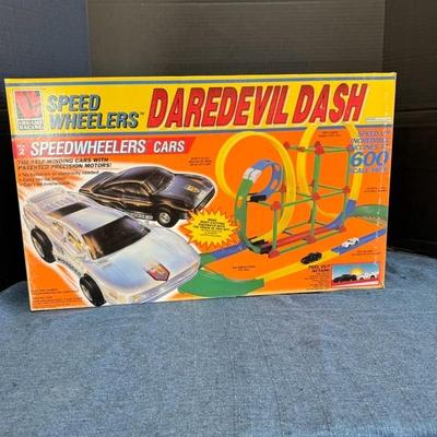 lot 1206 vintage speed, wheelers daredevil Dash cars.