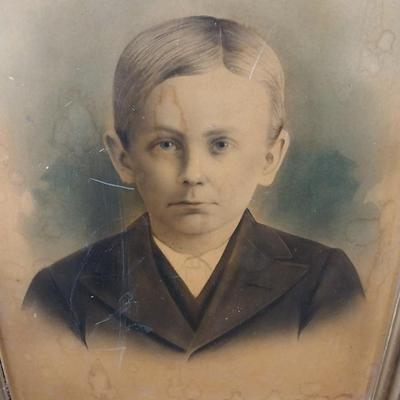ANTIQUE PHOTO IN AN ANTIQUE FRAME