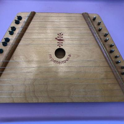 MUSIC MAKER WITH LOTS OF MUSIC IN CASE