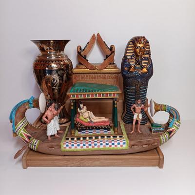 LOT14-O: Egyptian Collectibles and Memorabilia Youssef Hafez Vase, King Tut Sarcophagus & Mummy Figure, Miniature Cleopatra Barge and More