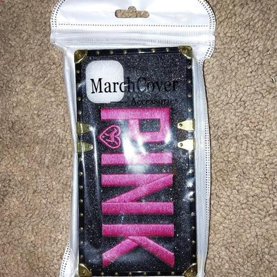 NEW CD/DVD HOLDER AND TWO NEW PHONE CASES