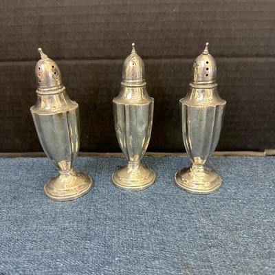 Lot 1305 Three Sterling weighted salt shakers