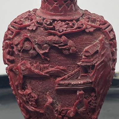 20th Century Chinese carved Garden Cinnabar Snuff bottle