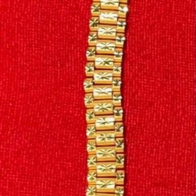 24 Karat gold ladies bracelet. .4 inches wide.  37.5 grams