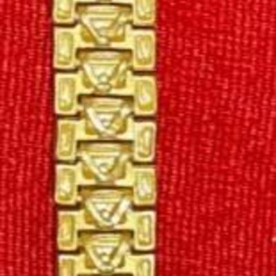24 Karat gold ladies bracelet. .4 inches wide.  50.1 grams