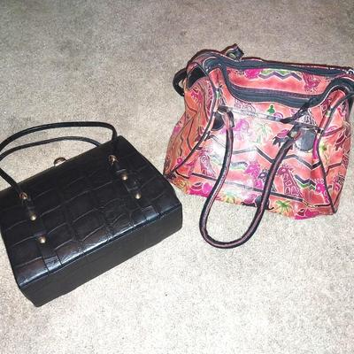 BLACK CLUTCH WITH STRAPS AND LEATHER HANDBAG WITH UNIQUE DESIGN