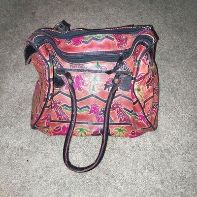 BLACK CLUTCH WITH STRAPS AND LEATHER HANDBAG WITH UNIQUE DESIGN