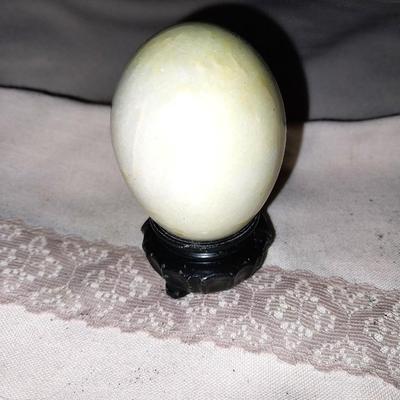 THREE COLORFUL GEO EGGS ON STANDS