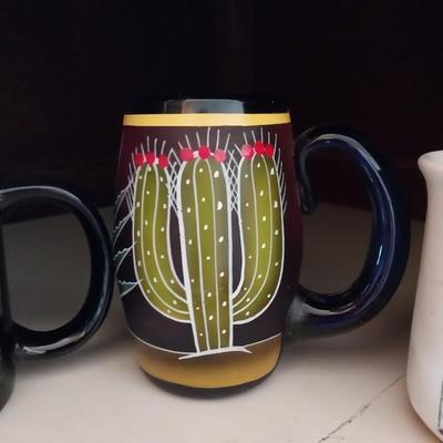 A VARIETY OF GLASSWARE AND VERY NICE, UNIQUE COFFEE MUGS