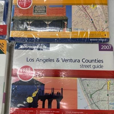 Lot 1349 collection of Thomas guide maps, three still in shrink wrap plastic