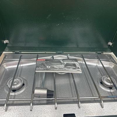 Lot 1416 Coleman, three burner propane stove, and propane Northstar lantern