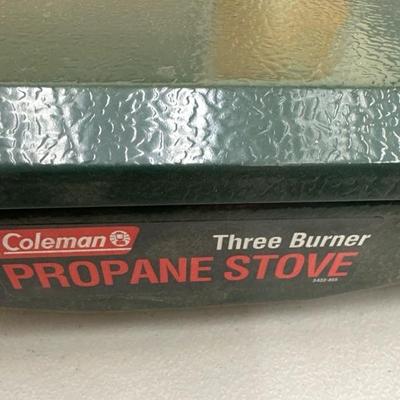 Lot 1416 Coleman, three burner propane stove, and propane Northstar lantern
