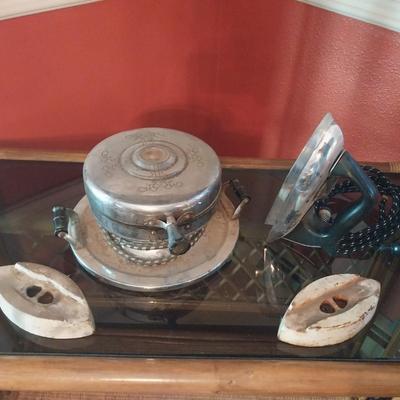 VINTAGE WAFFLE MAKER, ELECTRIC IRON AND 2 SAD IRONS
