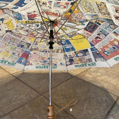 Vintage Star Tribune Umbrella decorated with comics