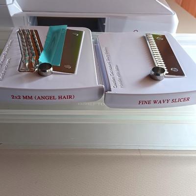 Brieftons 10 Blade Spiralizer / Food chopper Stainless Steel Blades with storage organizer and lidded container