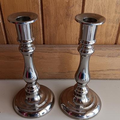 Two matching sets of candle holders - Gallery & Silverplated - and a pack of tapered candles