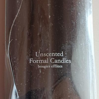 Two matching sets of candle holders - Gallery & Silverplated - and a pack of tapered candles